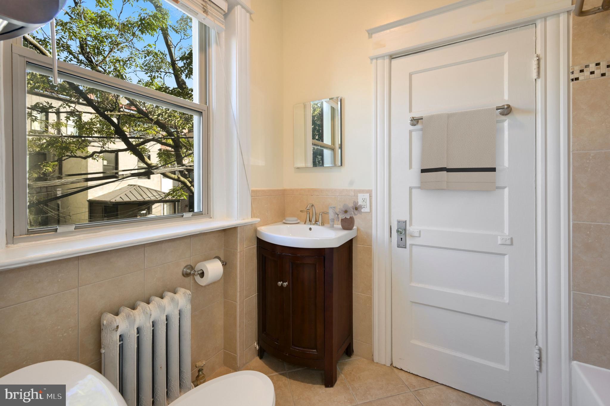 1833 S Street Northwest, Unit 25 Washington, DC 20009 - Photo 15 of 20 Bright bathroom