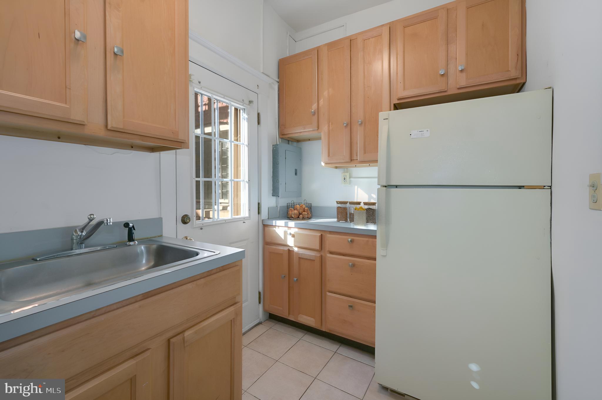 1833 S Street Northwest, Unit 25 Washington, DC 20009 - Photo 8 of 20 Kitchen w/access to balcony