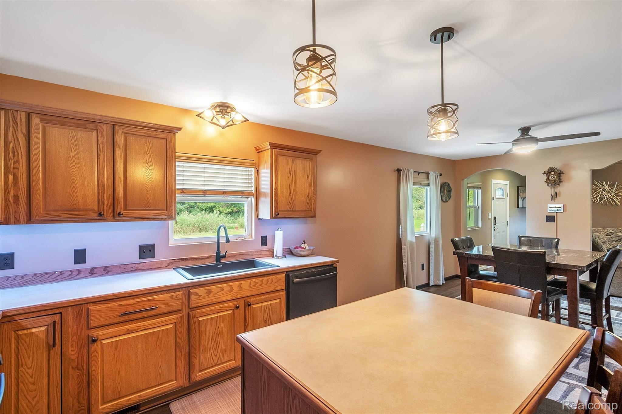 22115 Haggerty Road Belleville, MI 48111 - Photo 25 of 47 KITCHEN/BONUS ISLAND/SNCAK BAR