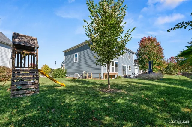 a view of a backyard with a garden