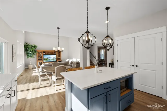 a view of living room and kitchen with furniture