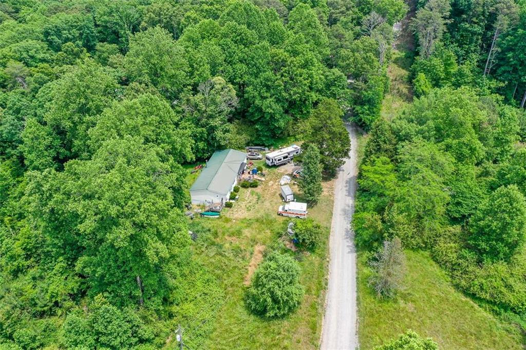 1010 Painter Road Talking Rock, GA 30175 - Photo 5 of 25 an aerial view of residential house with outdoor space and trees all around