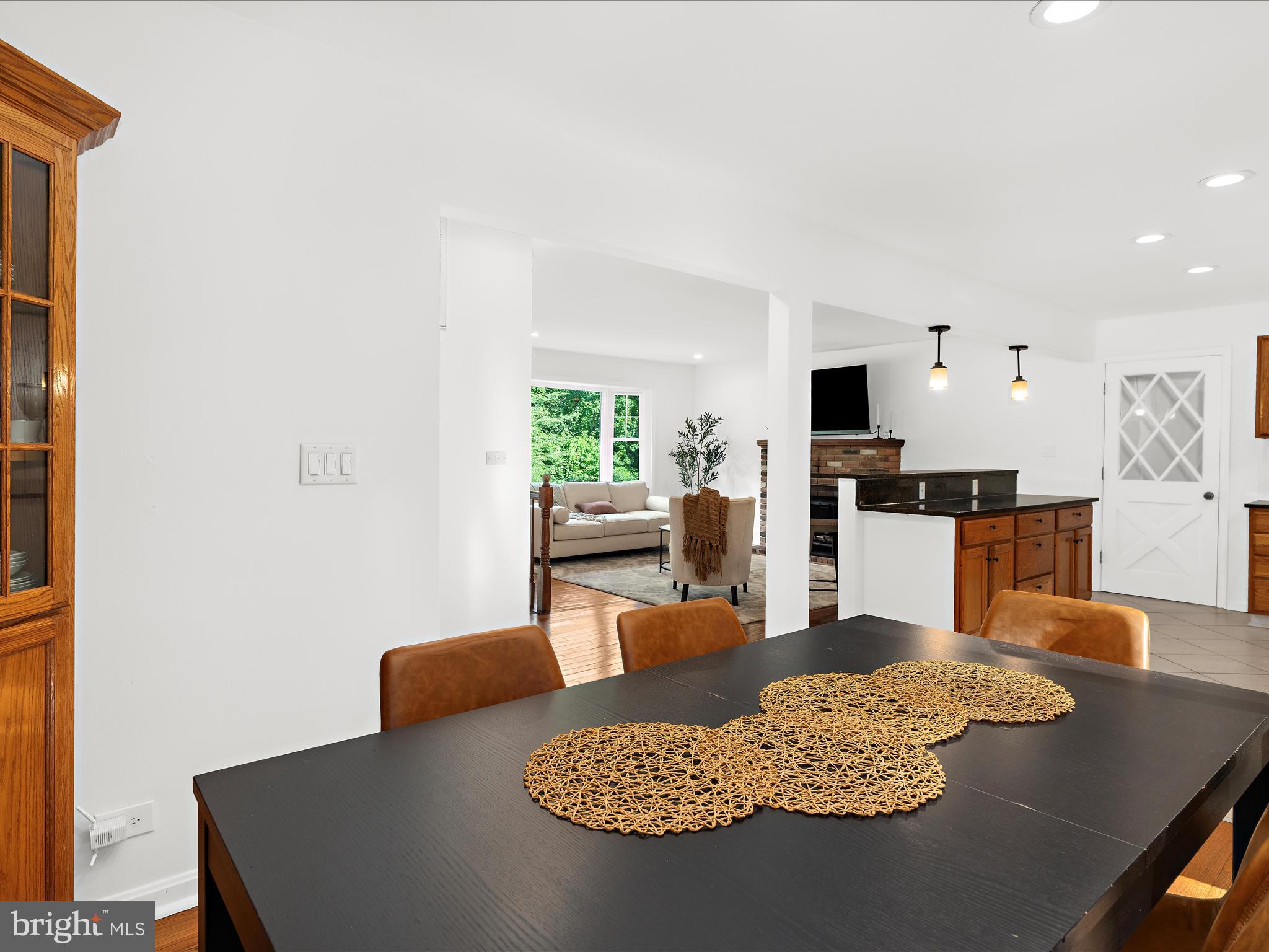 5306 Stone Road Frederick, MD 21703 - Photo 13 of 61 a living room with furniture and a view of kitchen