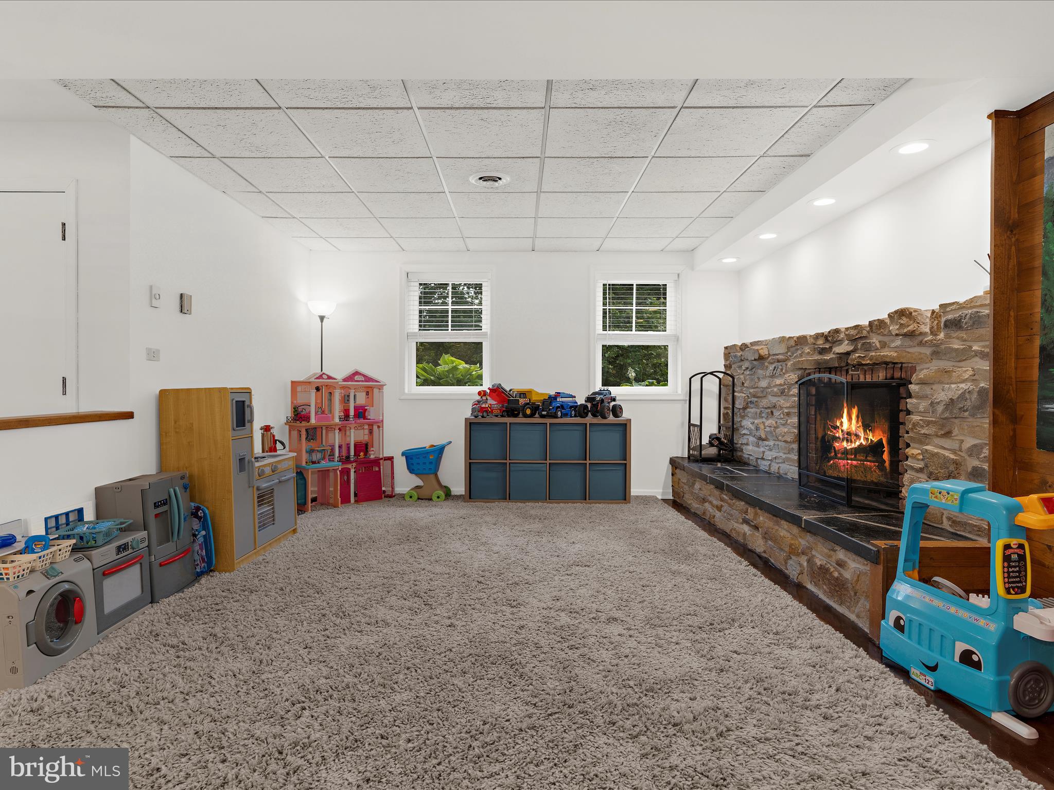 5306 Stone Road Frederick, MD 21703 - Photo 19 of 61 a living room with furniture and a flat screen tv