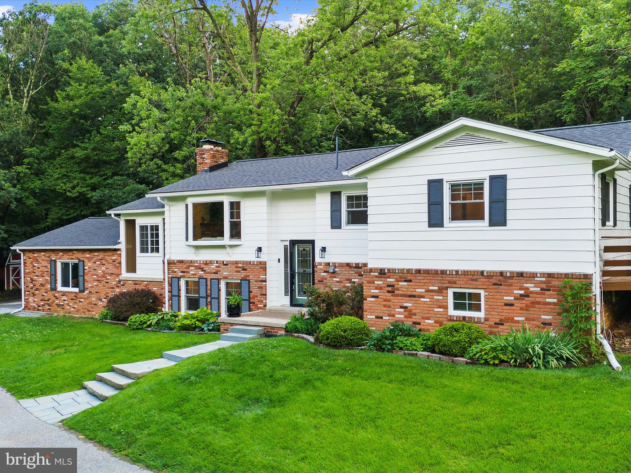 5306 Stone Road Frederick, MD 21703 - Photo 2 of 61 a front view of house with yard and green space