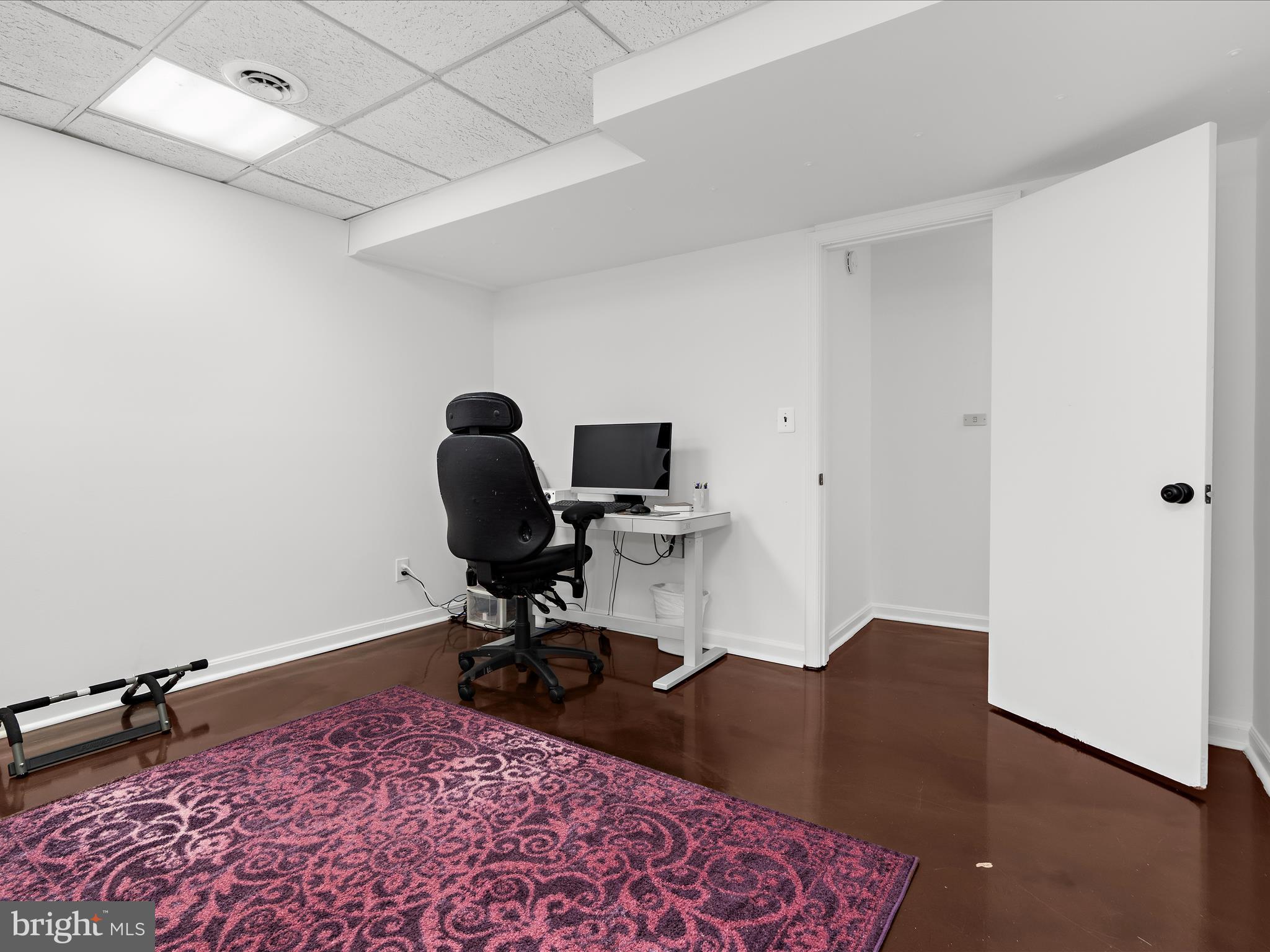 5306 Stone Road Frederick, MD 21703 - Photo 26 of 61 a view of a workspace with furniture and a window