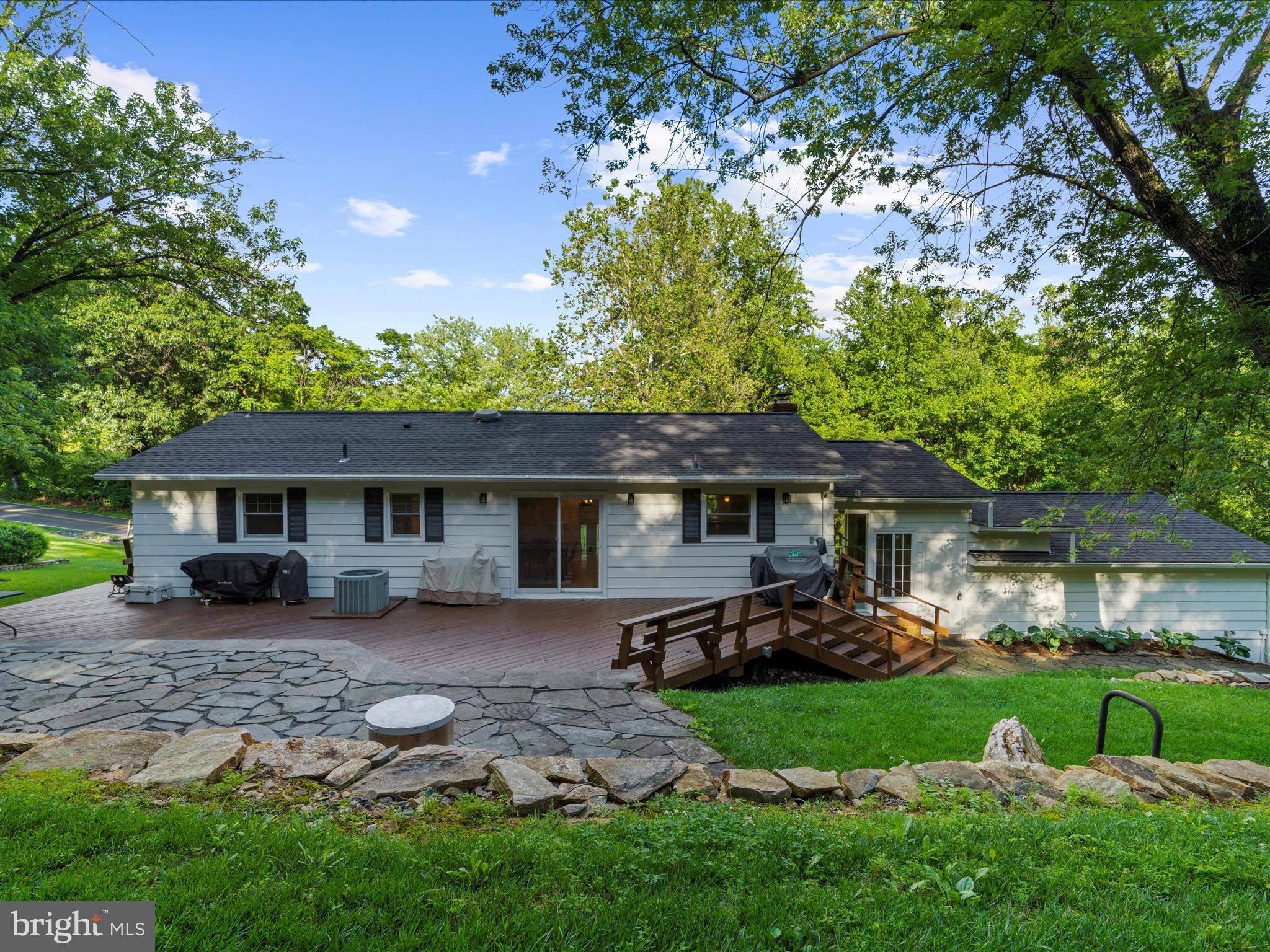 5306 Stone Road Frederick, MD 21703 - Photo 43 of 61 a front view of a house with a garden