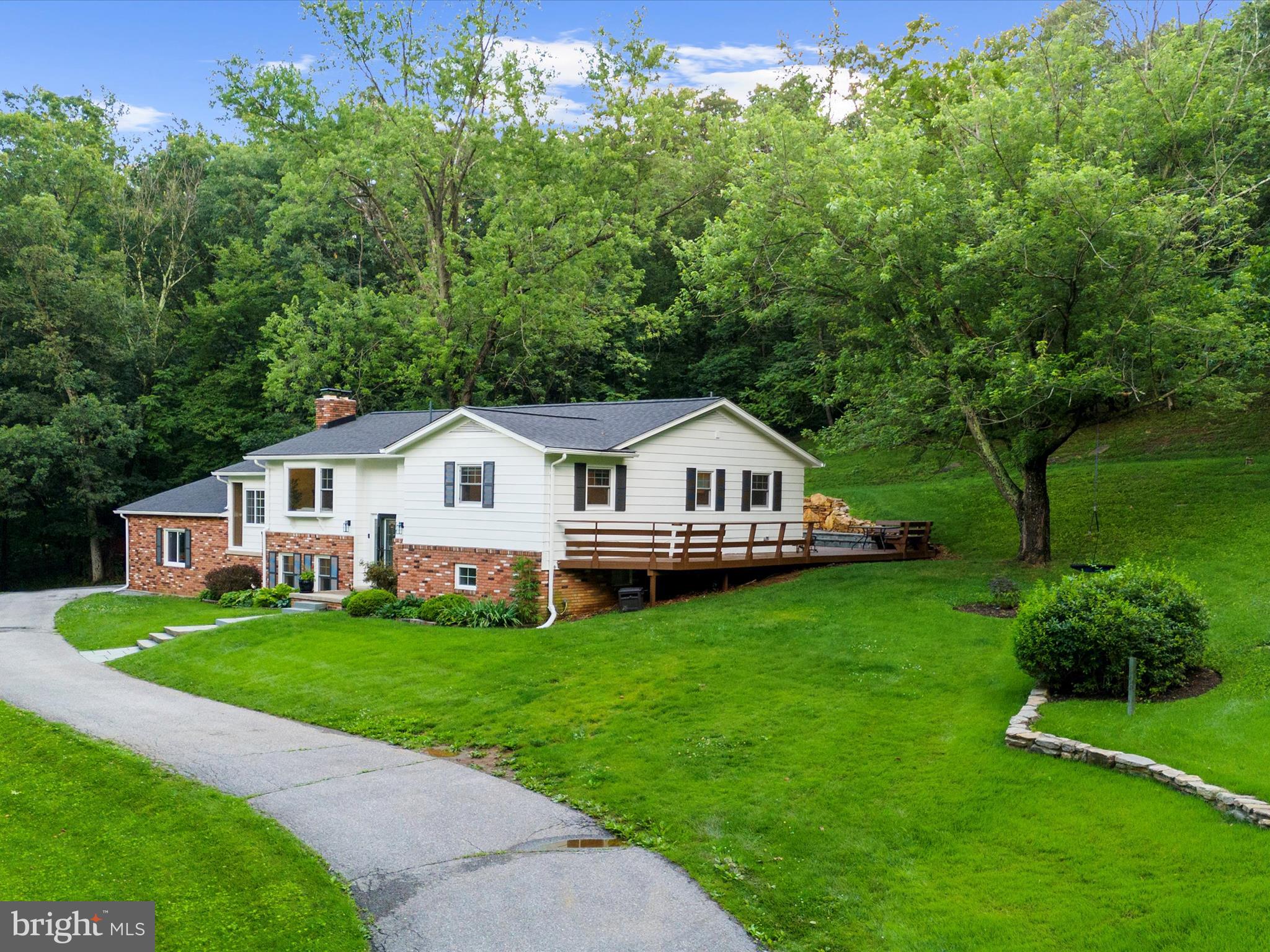 5306 Stone Road Frederick, MD 21703 - Photo 49 of 61 a front view of a house with garden