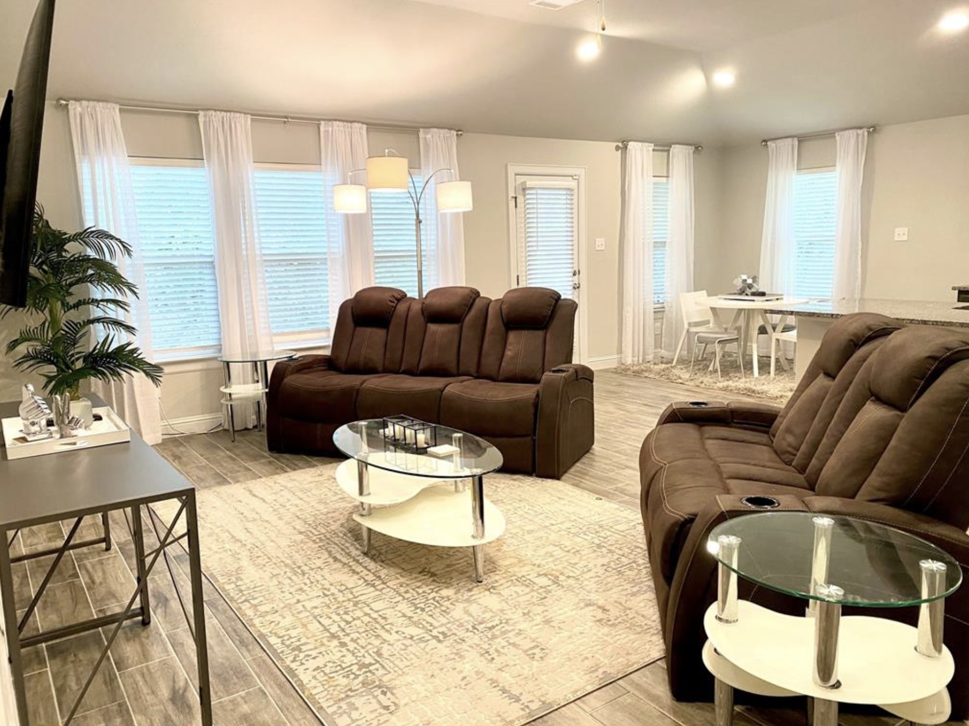 21643 Boggy Ford Road Lago Vista, TX 78645 - Photo 6 of 14 a living room with furniture and a large window