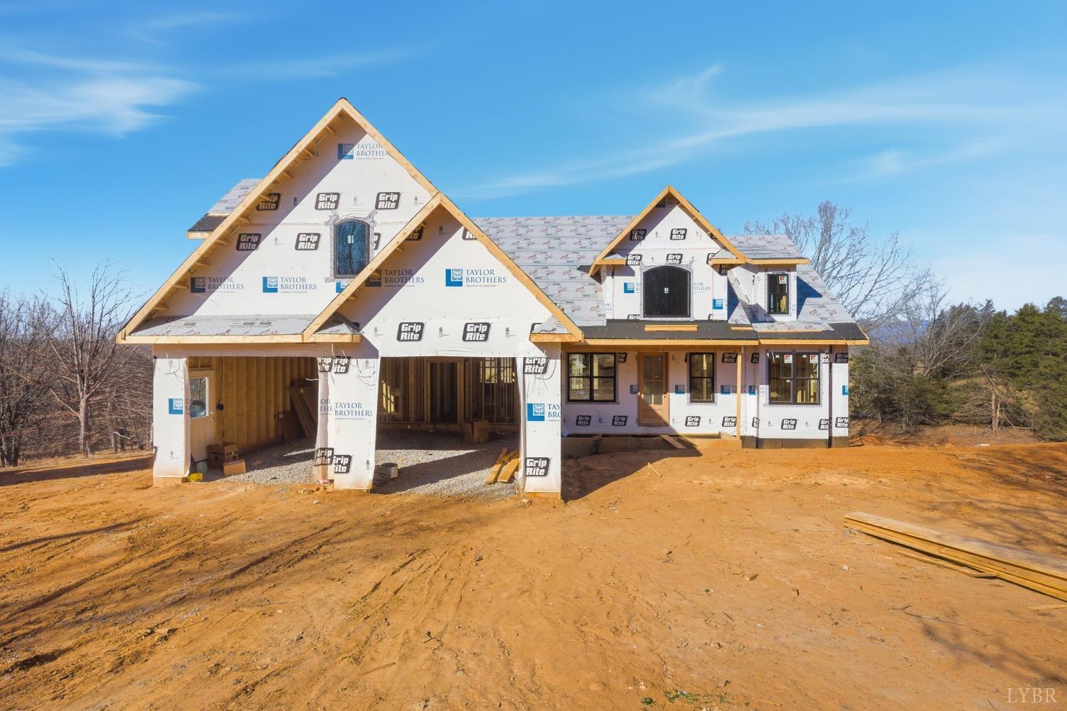 7 Wingfield Drive Goode, VA 24556 - Photo 2 of 41 a view of a house with wooden fence and a porch