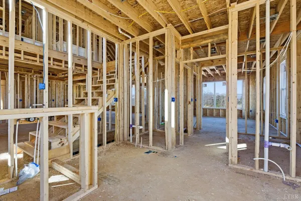 a view of an empty room with windows