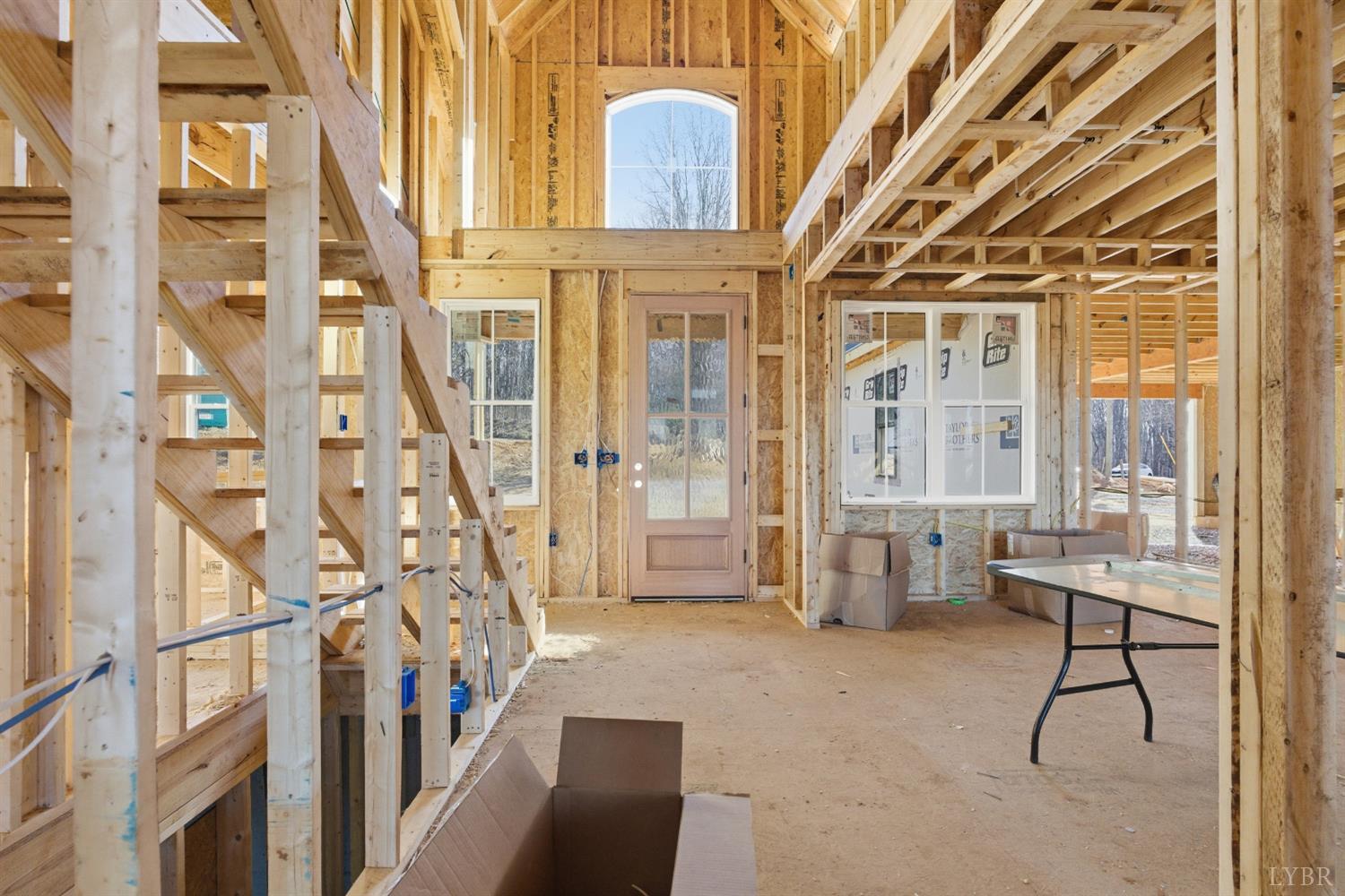 7 Wingfield Drive Goode, VA 24556 - Photo 5 of 41 a living room with a furniture and a floor to ceiling window