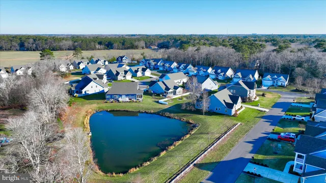 a view of a two chairs in the balcony