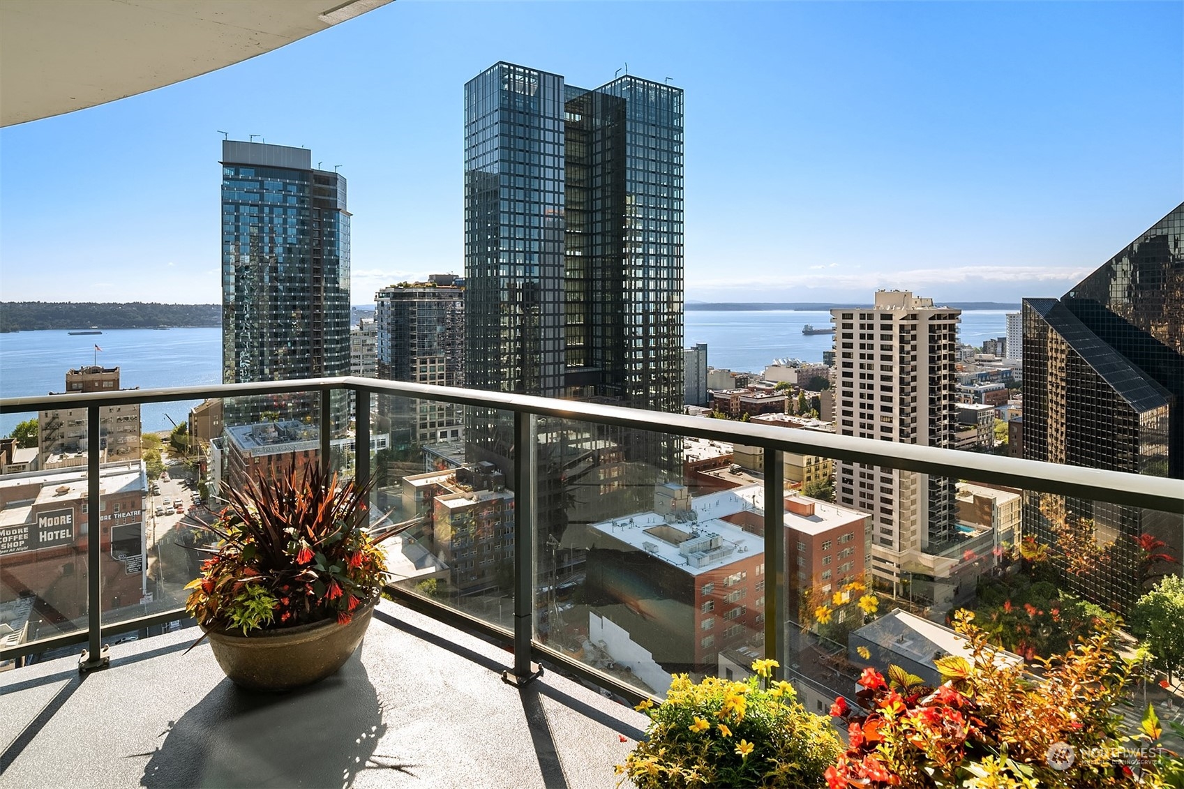 1920 4th Avenue, Unit 2401 Seattle, WA 98101 - Photo 29 of 40 a view of a balcony with chairs