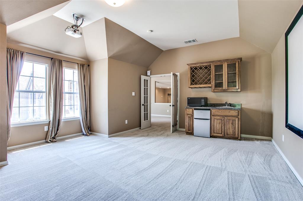 1318 Haddington Lane Keller, TX 76248 - Photo 18 of 37 a view of kitchen with stainless steel appliances granite countertop a stove top oven a sink and a refrigerator