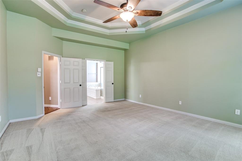 1318 Haddington Lane Keller, TX 76248 - Photo 20 of 37 a view of a room with a ceiling fan and a bathroom