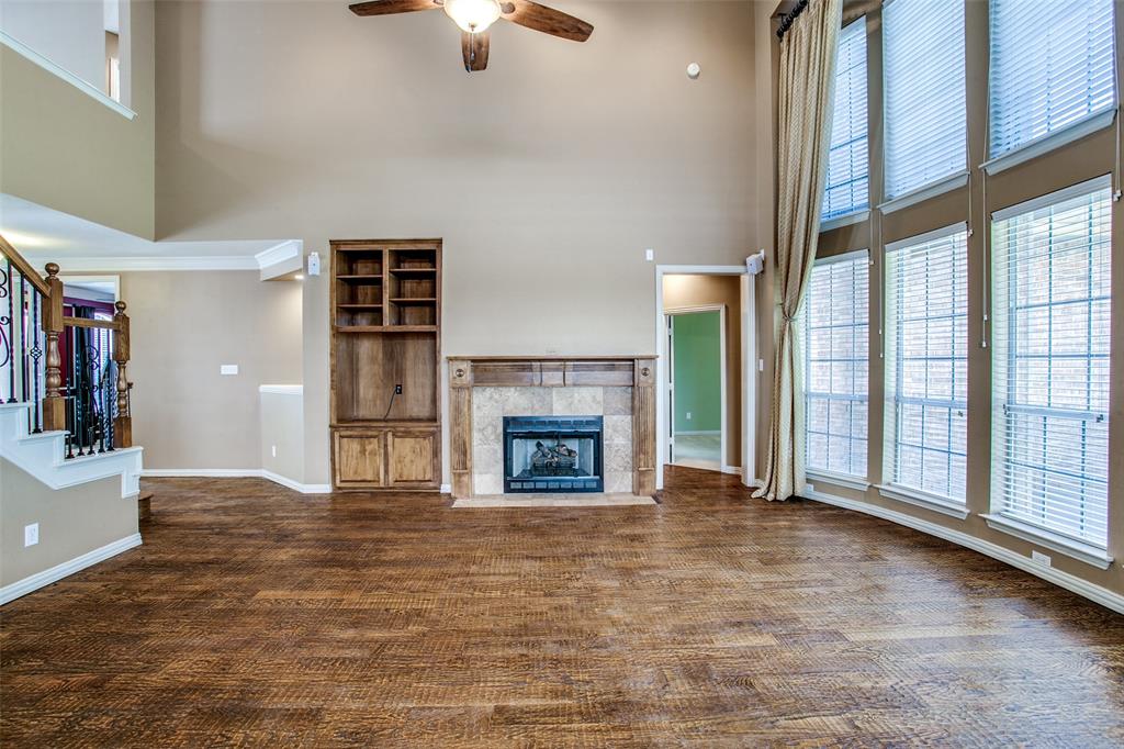 1318 Haddington Lane Keller, TX 76248 - Photo 5 of 37 a view of an empty room with window and fire place