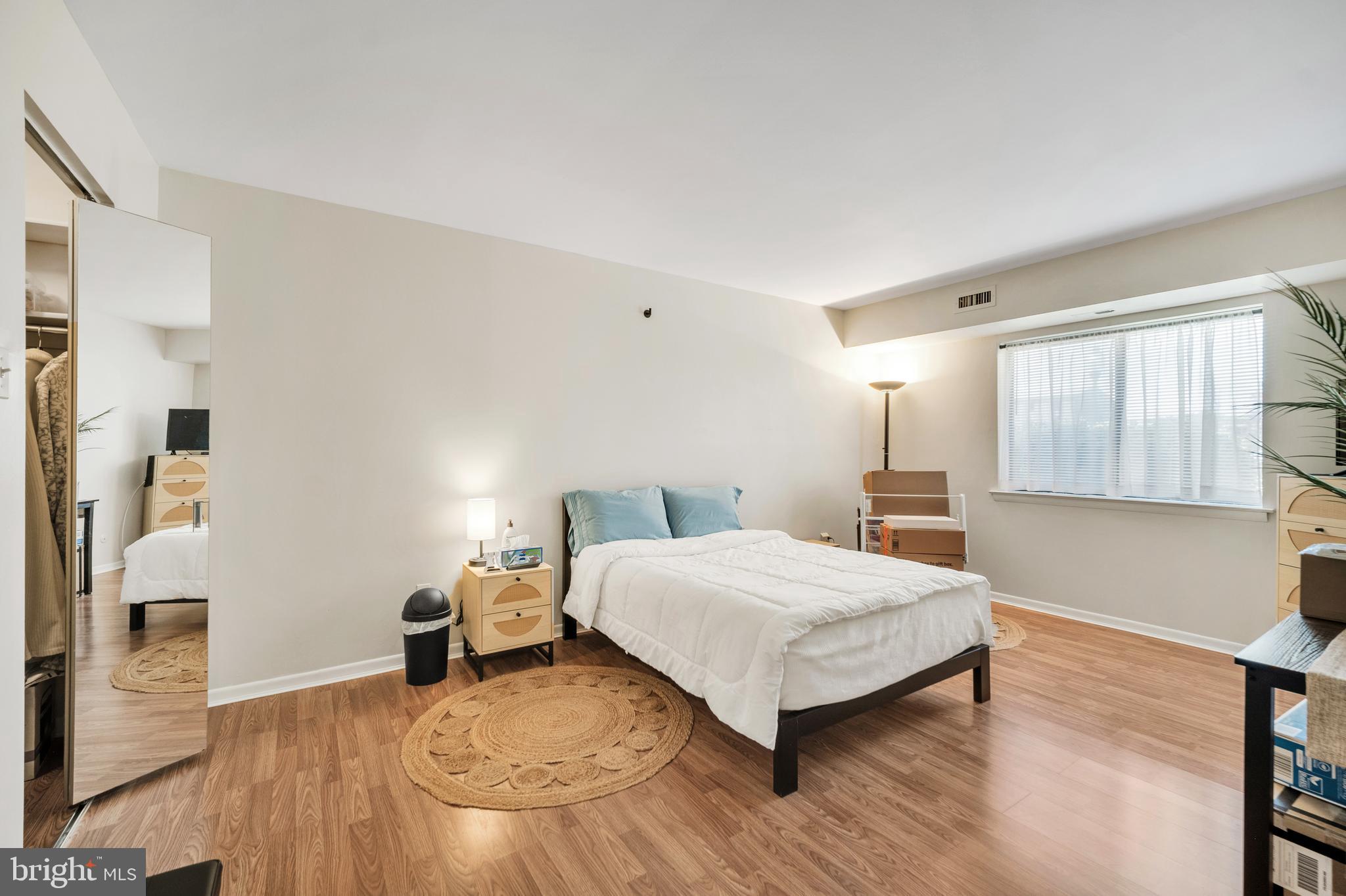 50103 Delaire Landing Road, Unit 50103 Philadelphia, PA 19114 - Photo 20 of 27 a bedroom with a bed and window