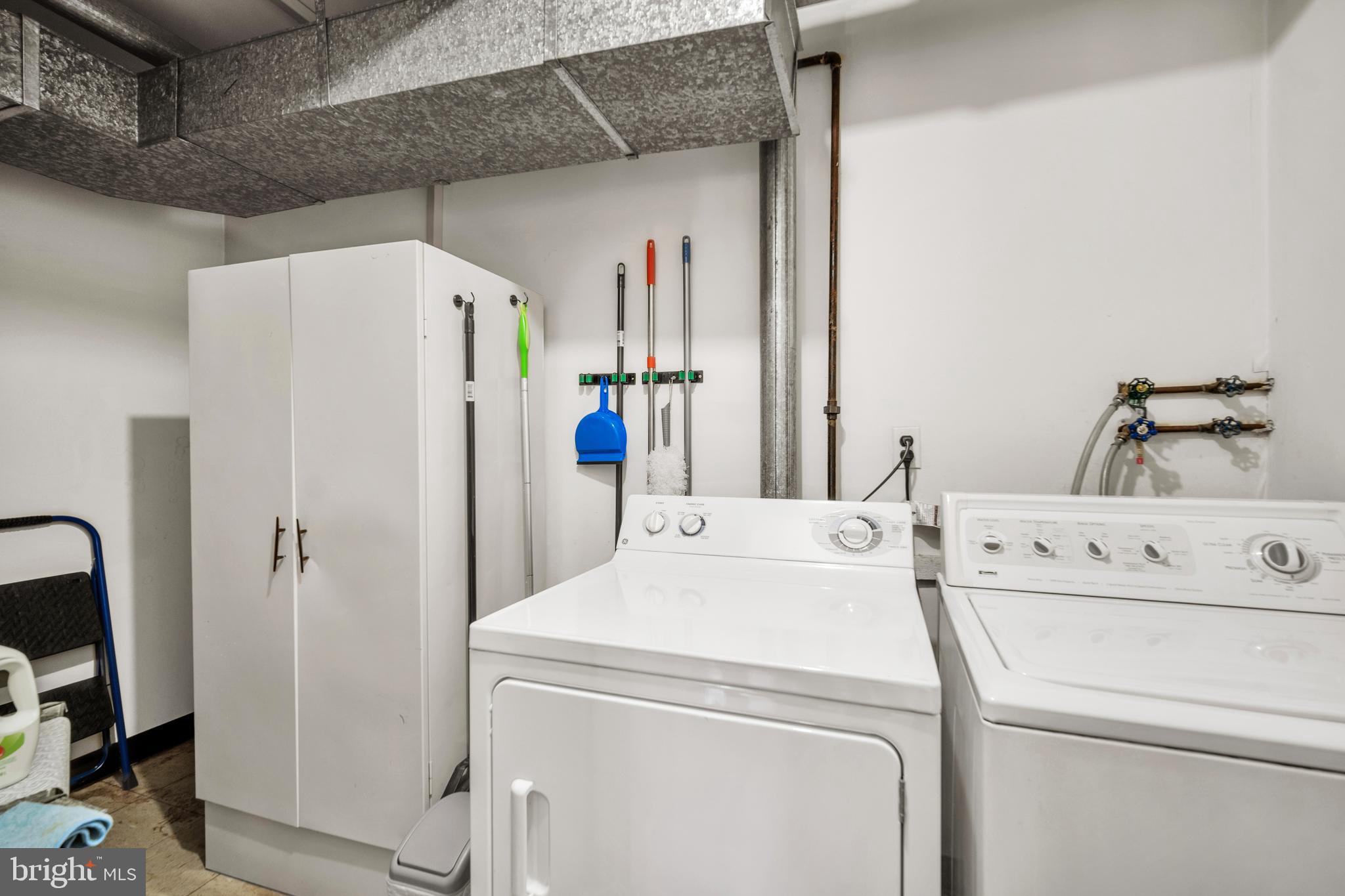 50103 Delaire Landing Road, Unit 50103 Philadelphia, PA 19114 - Photo 8 of 27 a utility room with dryer and washer