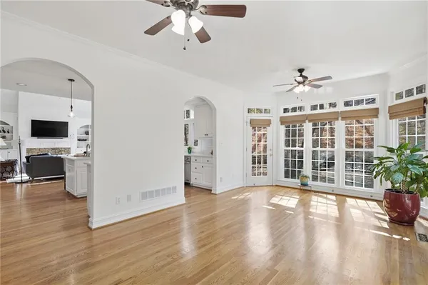 a living room with furniture rug and window