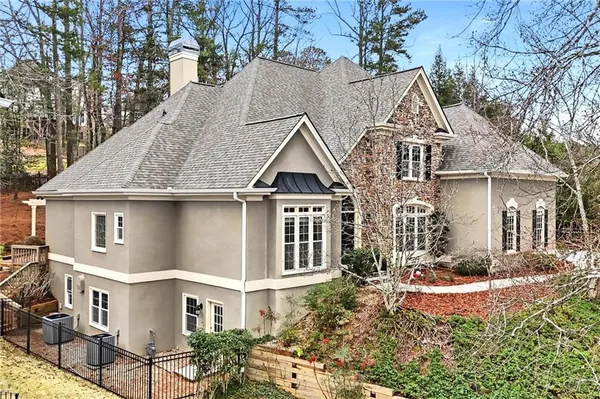 a front view of a house with yard