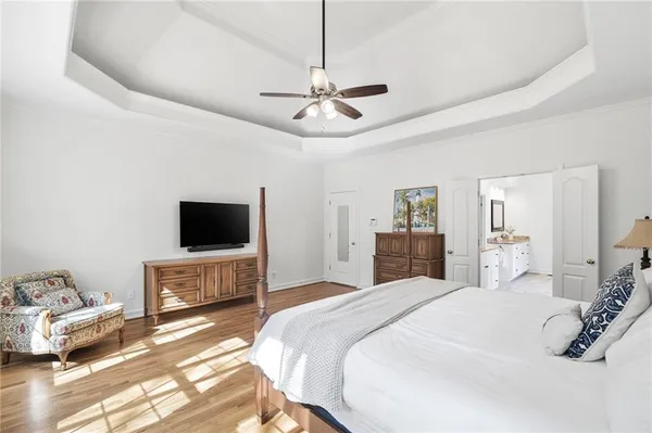 a bathroom with a granite countertop sink mirror and a