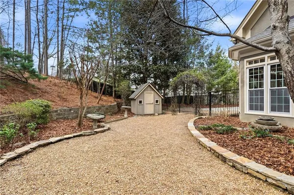 an aerial view of a house with outdoor space