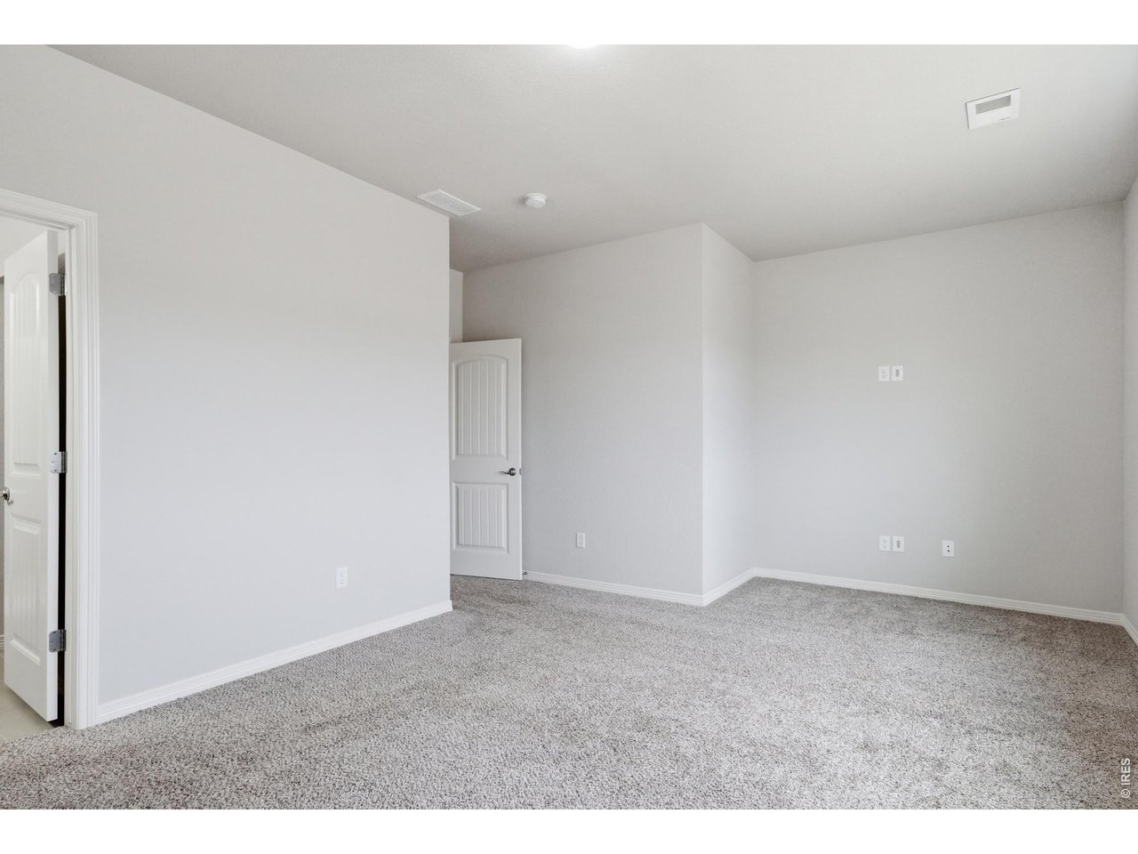 1692 Grand Avenue, Unit 2 Windsor, CO 80550 - Photo 16 of 31 Primary Bedroom