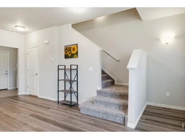 a view interior of a house with wooden floor and stairs