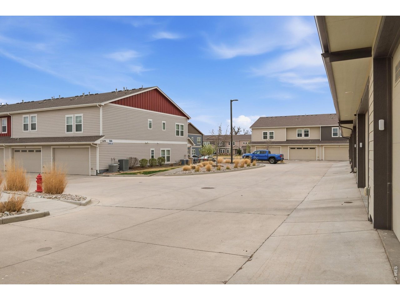 1692 Grand Avenue, Unit 2 Windsor, CO 80550 - Photo 29 of 42 Exterior Rear