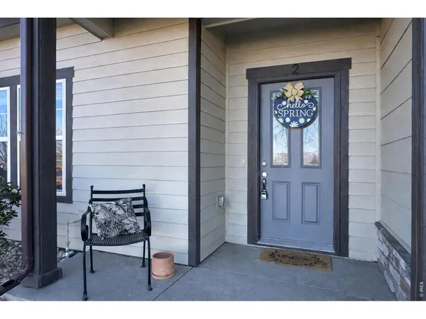 a view of a hallway with front door