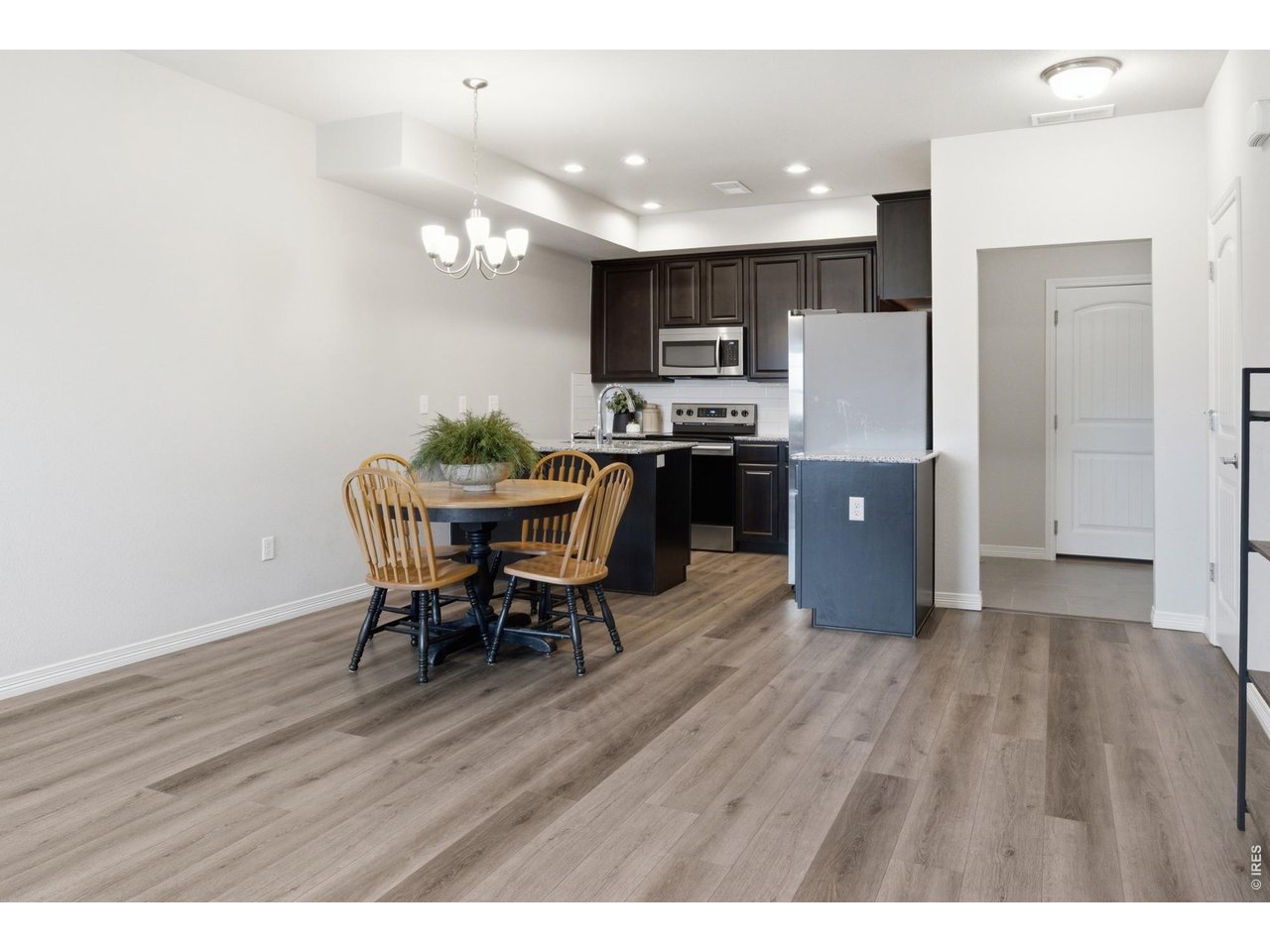 1692 Grand Avenue, Unit 2 Windsor, CO 80550 - Photo 5 of 31 Dining Area/ Kitchen