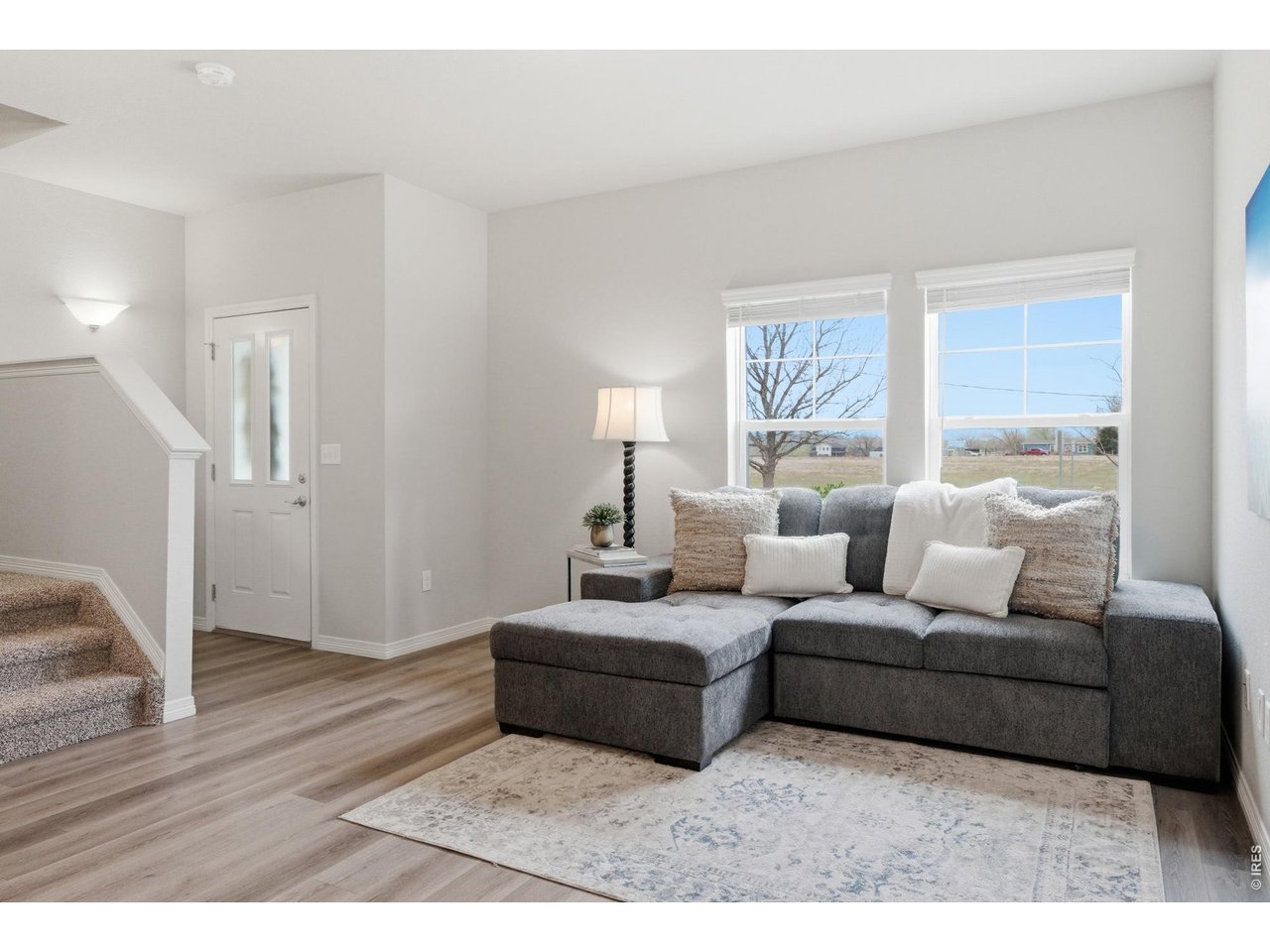 1692 Grand Avenue, Unit 2 Windsor, CO 80550 - Photo 8 of 42 Living Room and Entry