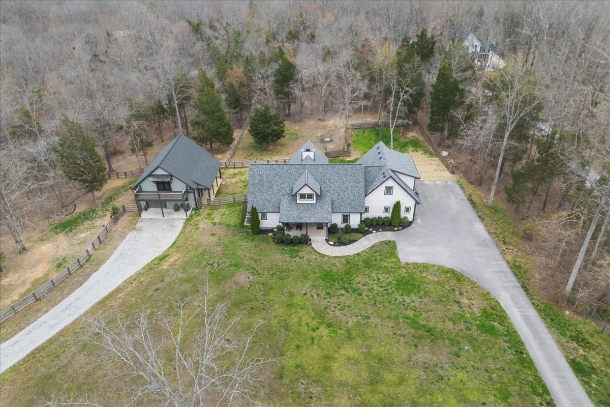 8006 Rose Ridge Pvt Lane Fairview, TN 37062 - Photo 11 of 87 an aerial view of a backyard with swimming pool