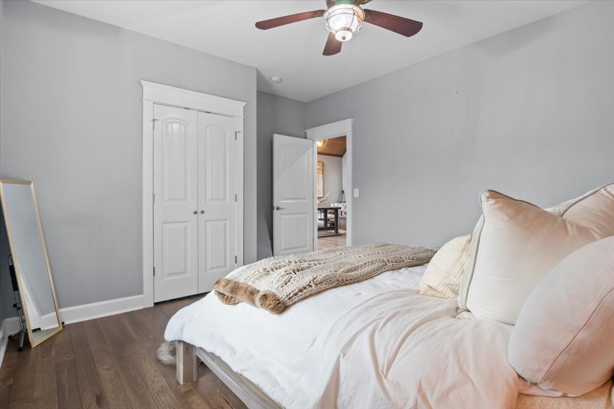 8006 Rose Ridge Pvt Lane Fairview, TN 37062 - Photo 32 of 87 a bedroom with a bed and a chandelier