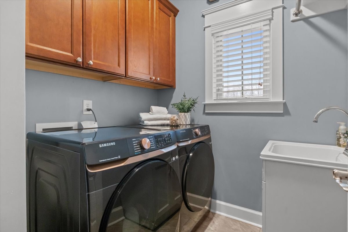 8006 Rose Ridge Pvt Lane Fairview, TN 37062 - Photo 36 of 87 a view of a storage and utility room with washer and dryer