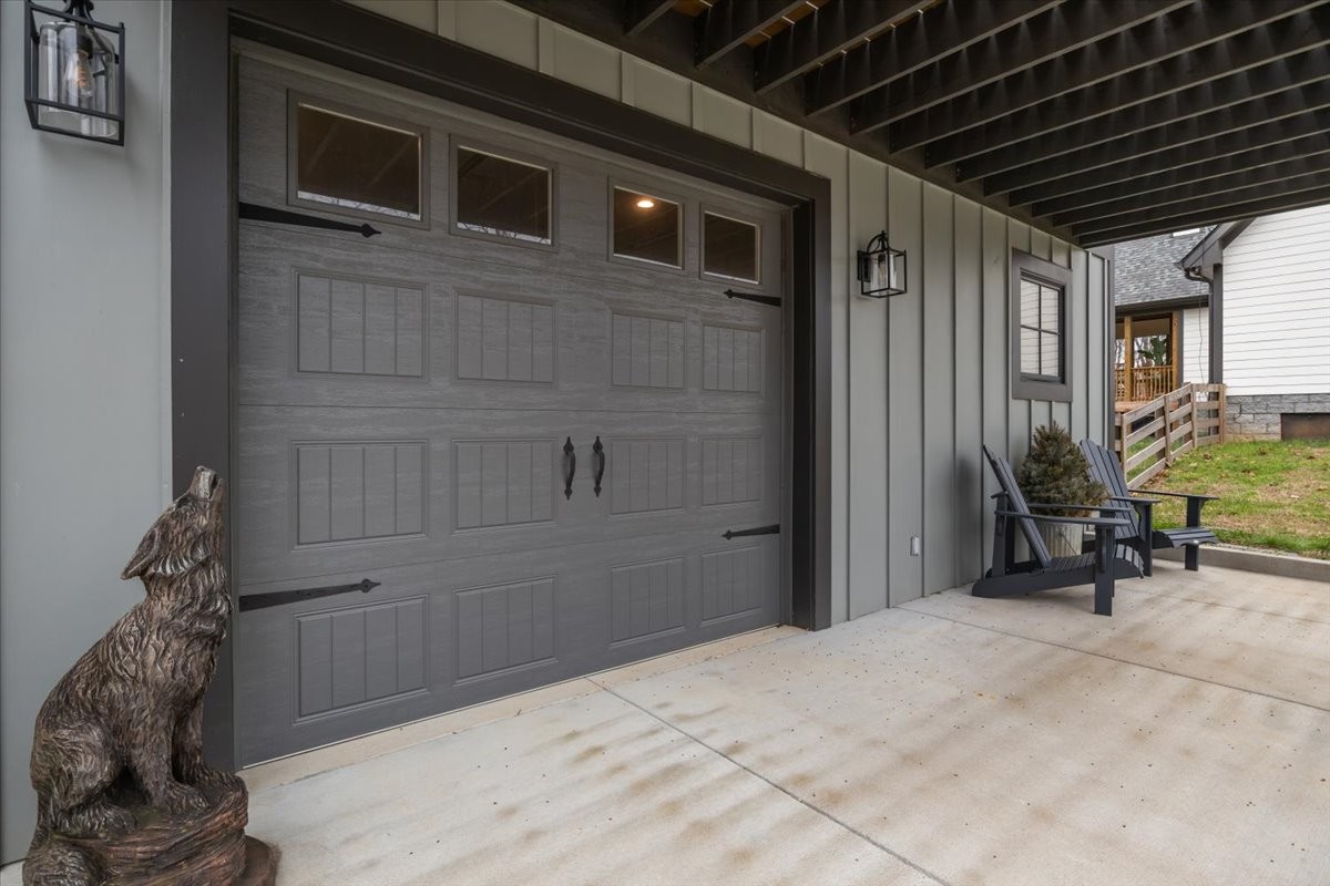 8006 Rose Ridge Pvt Lane Fairview, TN 37062 - Photo 48 of 87 a view of a porch with a table and chairs