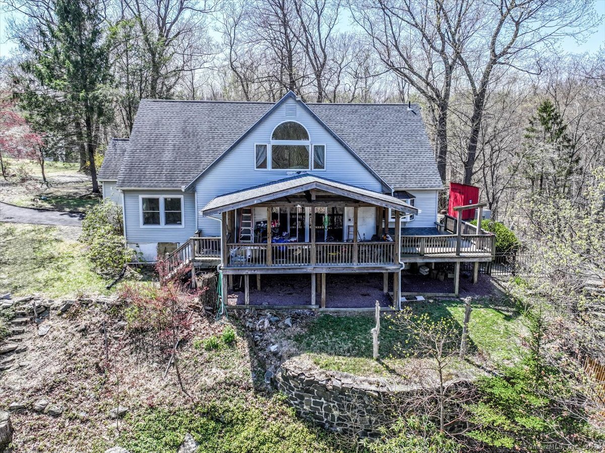 5 Laurel Hill Road North Sherman, CT 06784 - Photo 4 of 40 a front view of a house with garden