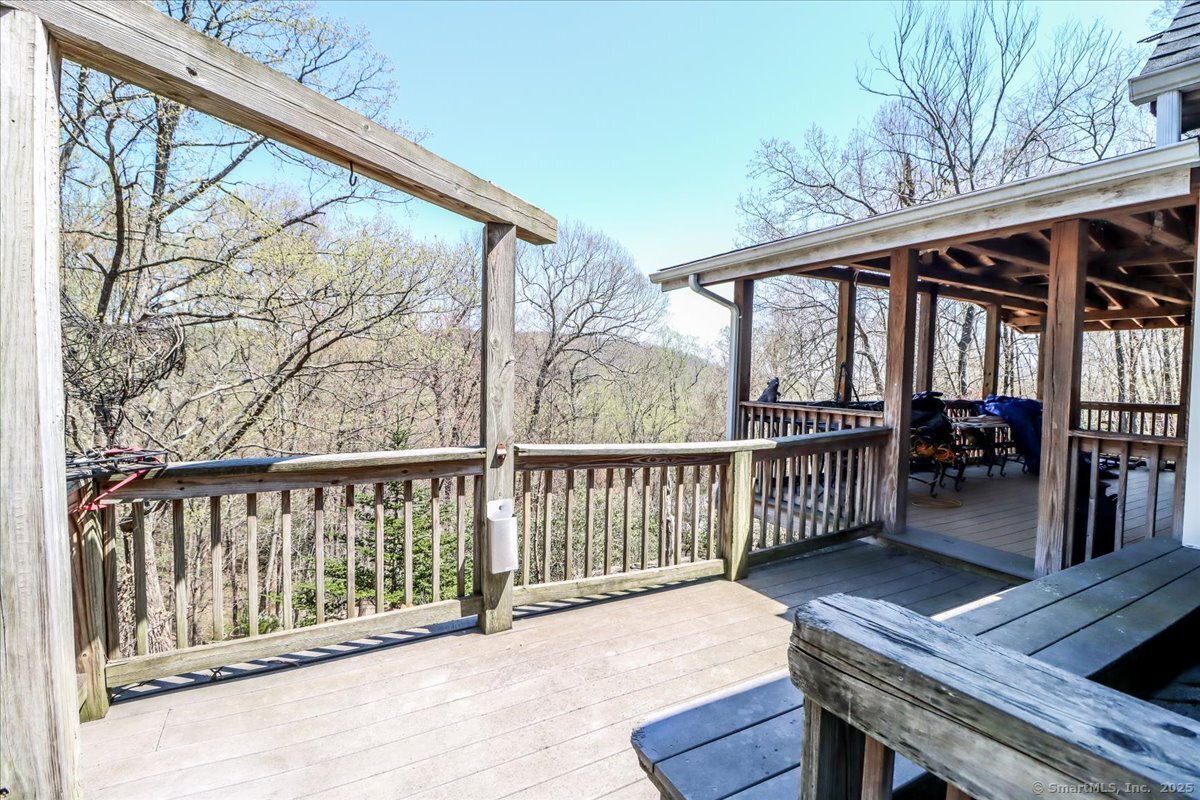 5 Laurel Hill Road North Sherman, CT 06784 - Photo 10 of 40 a balcony with wooden floor