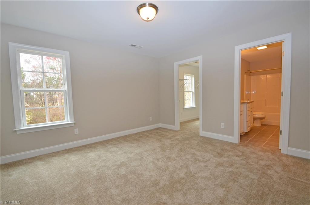 5571 Salem View Road Pfafftown, NC 27040 - Photo 20 of 27 Bedroom 3 with walk in closet and shared bath.