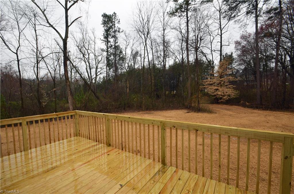 5571 Salem View Road Pfafftown, NC 27040 - Photo 24 of 27 Deck overlooking lovely flat back yard.