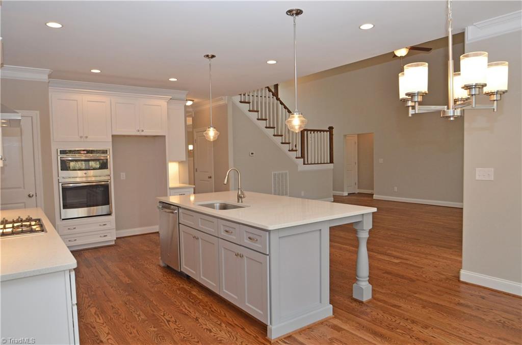 5571 Salem View Road Pfafftown, NC 27040 - Photo 9 of 27 Kitchen has quartz counter tops.