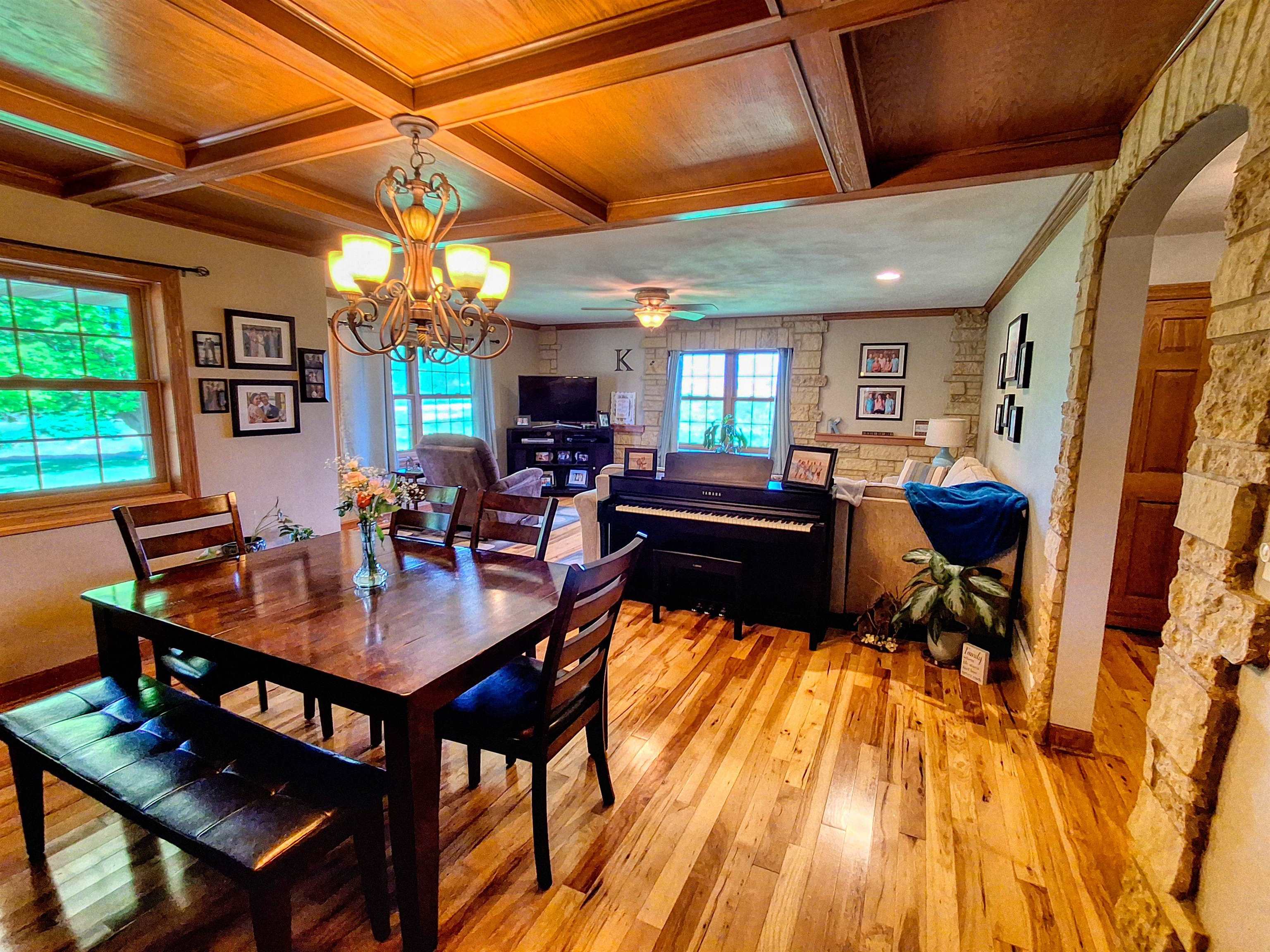 7009 West Pearl City Road Freeport, IL 61032 - Photo 11 of 35 a view of a dining room with furniture window and wooden floor