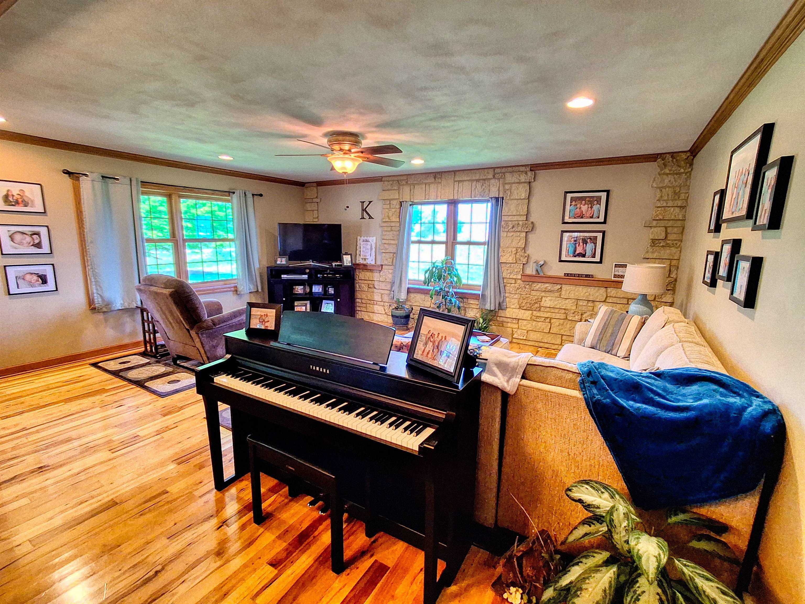 7009 West Pearl City Road Freeport, IL 61032 - Photo 12 of 35 a living room with furniture and a flat screen tv