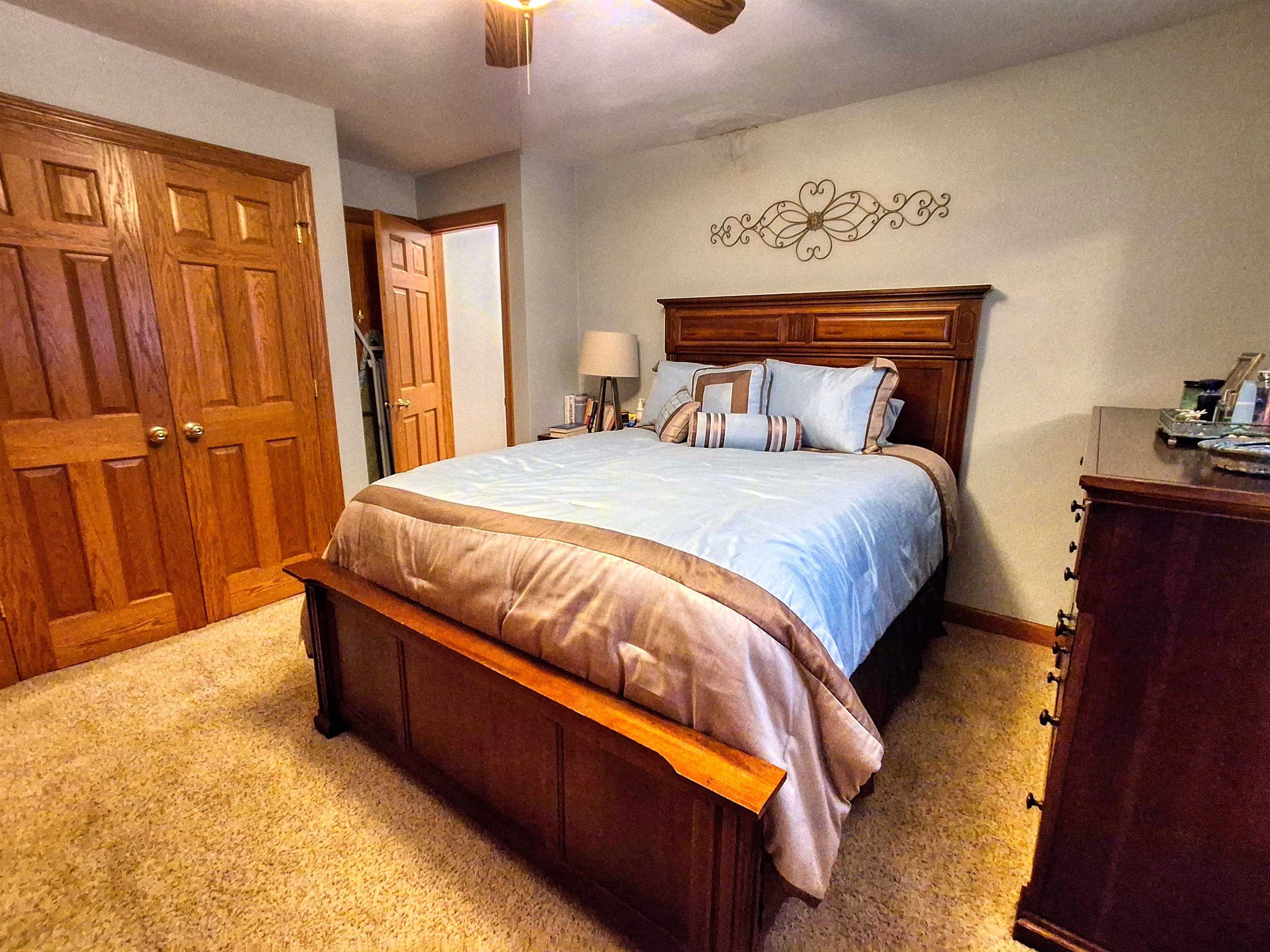 7009 West Pearl City Road Freeport, IL 61032 - Photo 17 of 35 a bedroom with a bed closet and window