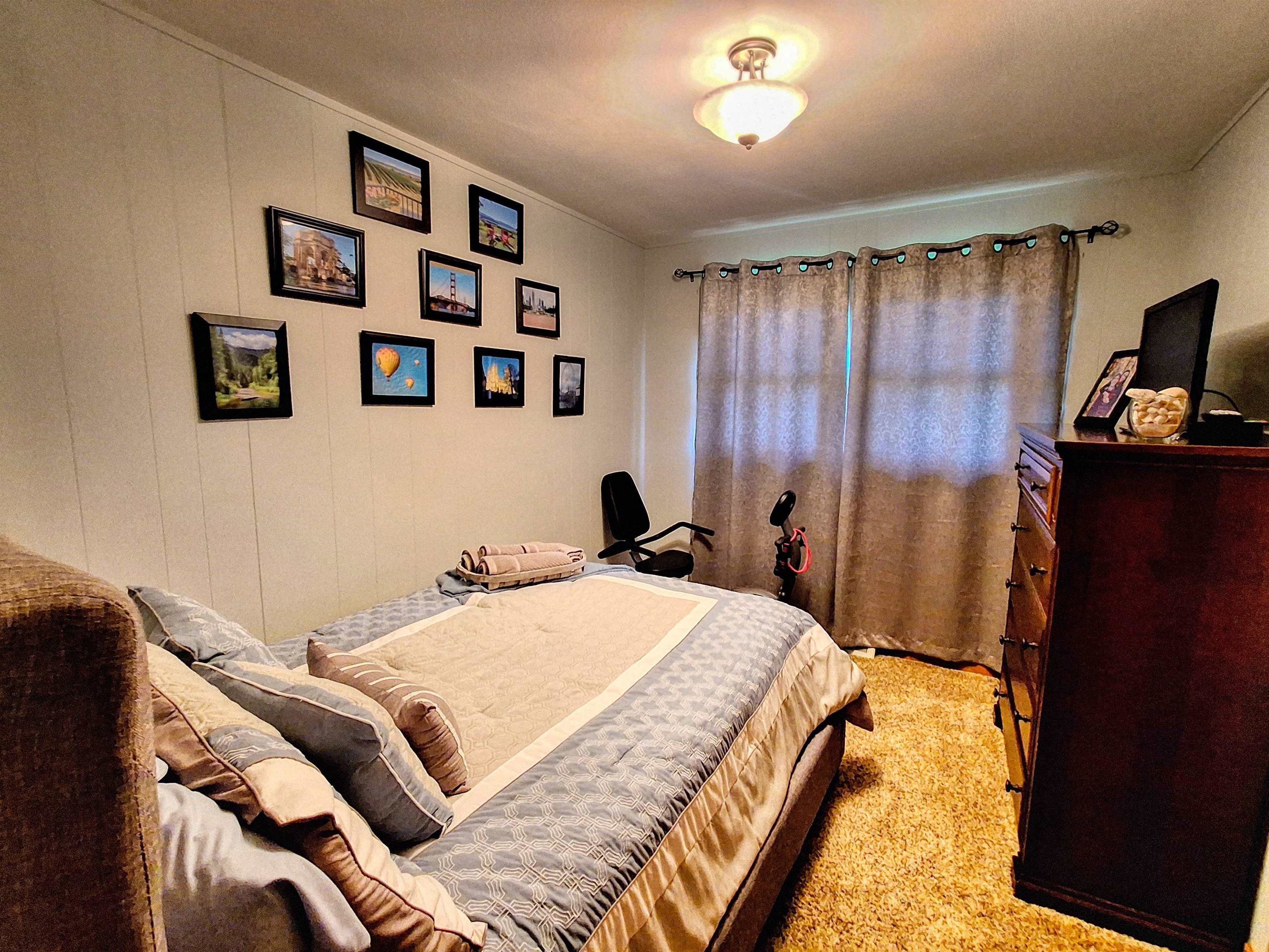 7009 West Pearl City Road Freeport, IL 61032 - Photo 22 of 35 a bedroom with a bed and a view of bathroom