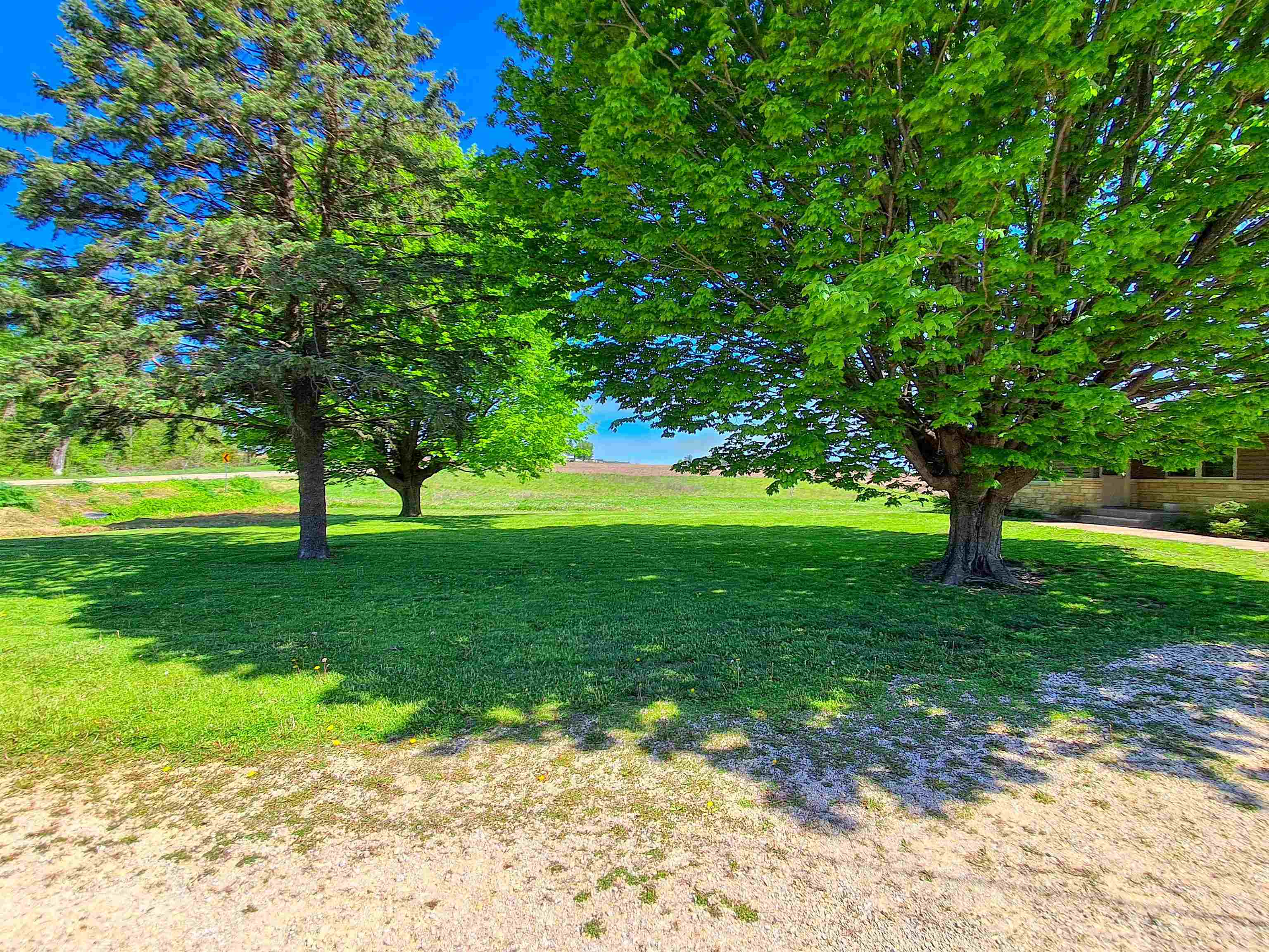 7009 West Pearl City Road Freeport, IL 61032 - Photo 32 of 35 a view of grassy field with benches