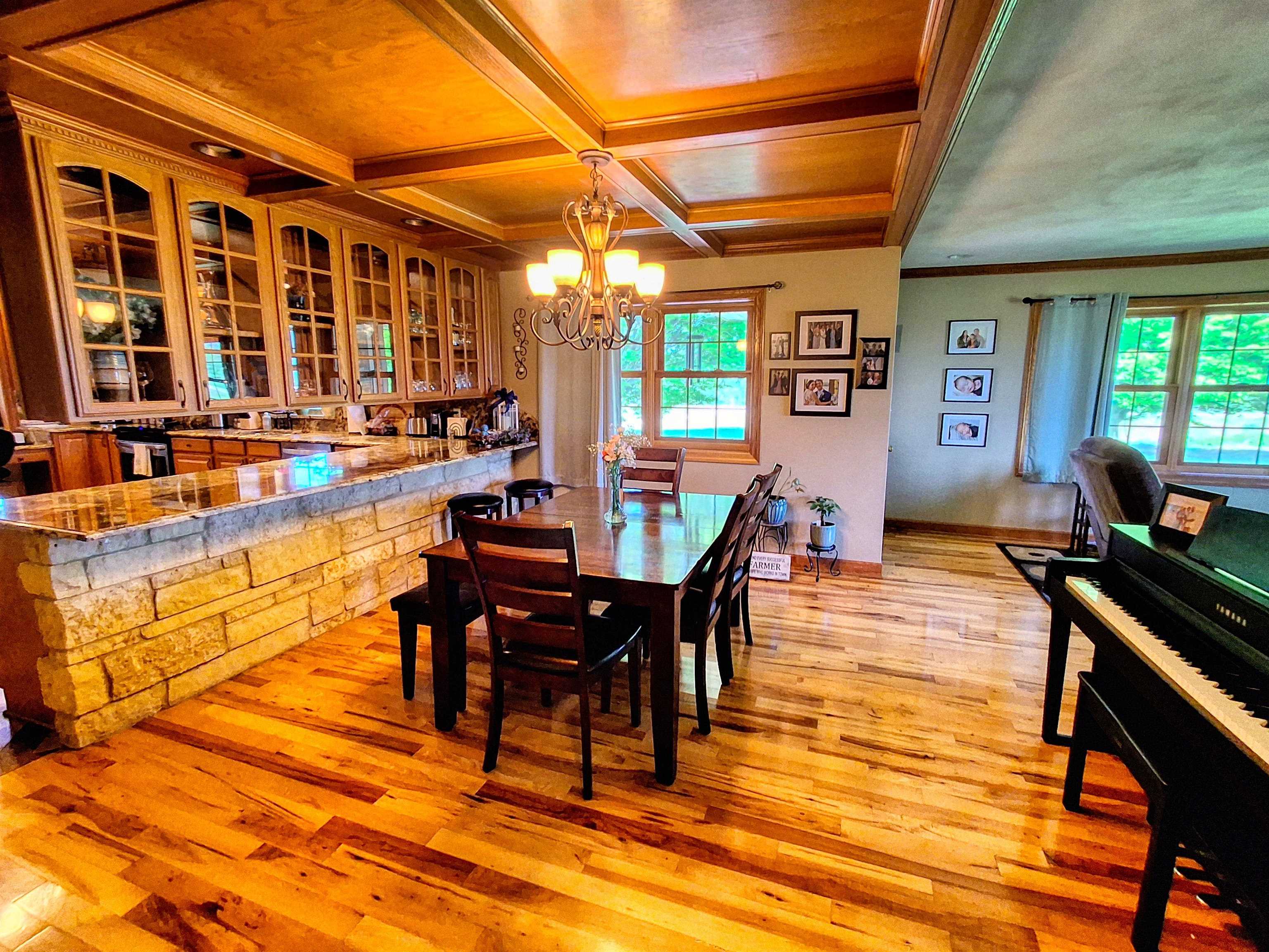 7009 West Pearl City Road Freeport, IL 61032 - Photo 10 of 35 a view of a dining room with furniture window and wooden floor