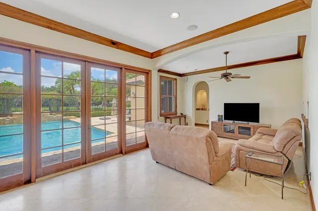 a large kitchen with a large window and counter space