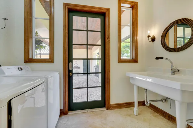 a bedroom with furniture and a window